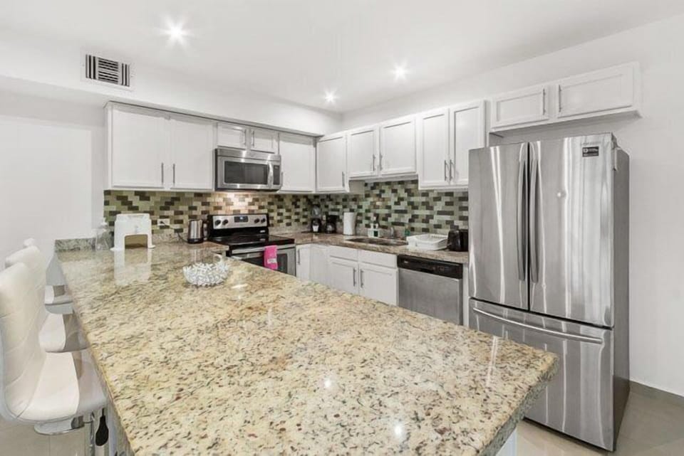 The kitchen is really well equipped, and has a breakfast bar.