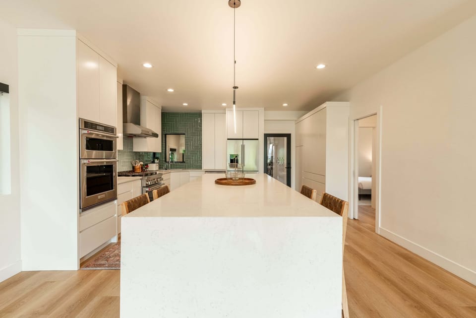 Fully Equipped Kitchen with huge island and bar seating for 4