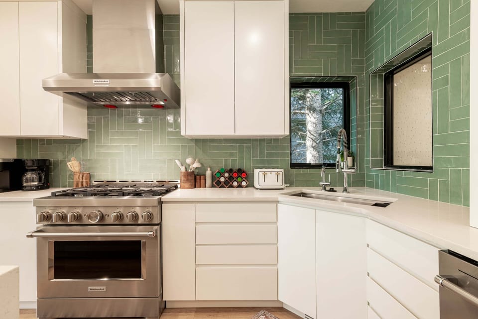 Fully Equipped Kitchen with Stainless Steel Appliances and Plenty of Space to Entertain