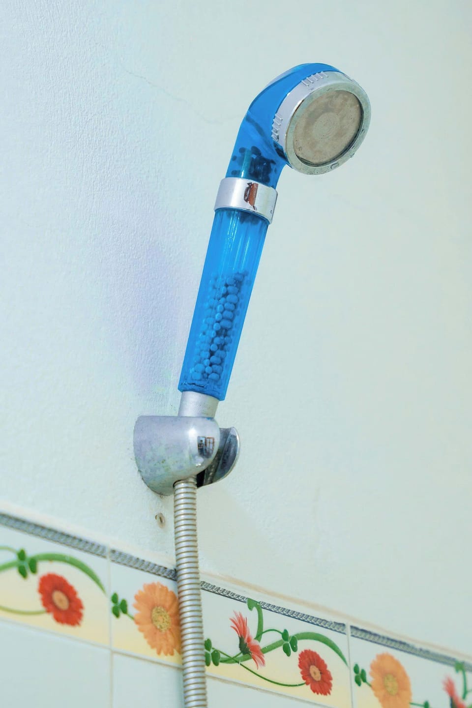Shower, hair dryer, slippers, towels