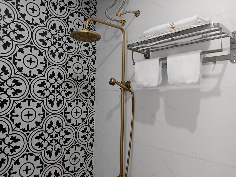 Deluxe Double Room, Balcony, Mountain View | Bathroom | Hair dryer, slippers, towels, soap