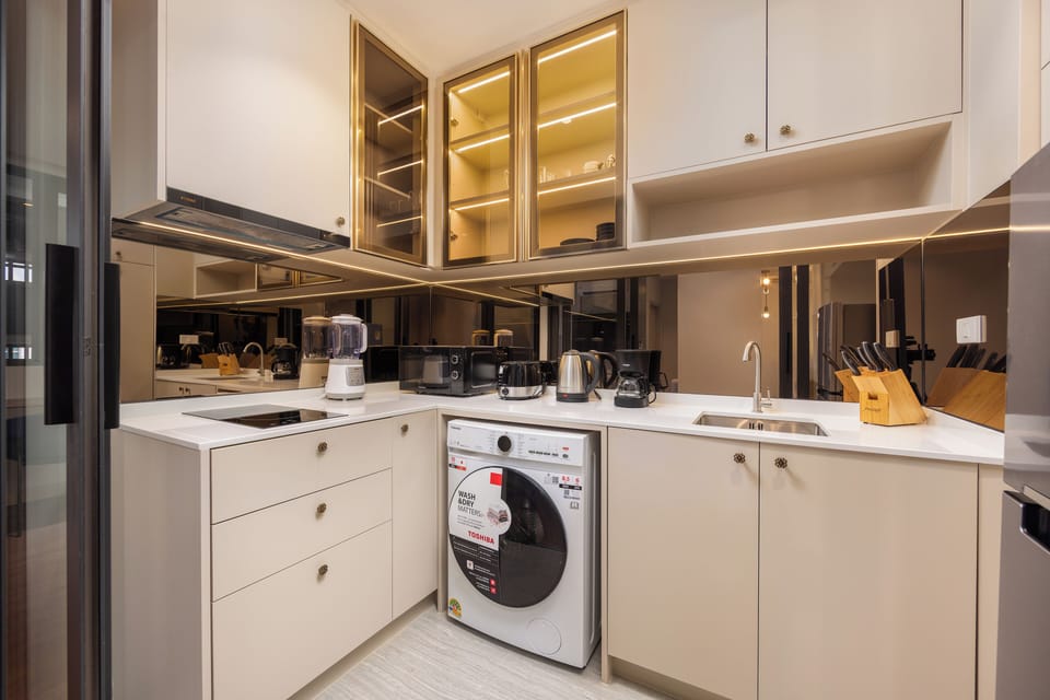 Design Suite, 2 Bedrooms | Private kitchenette | Coffee/tea maker, electric kettle, toaster, dining tables