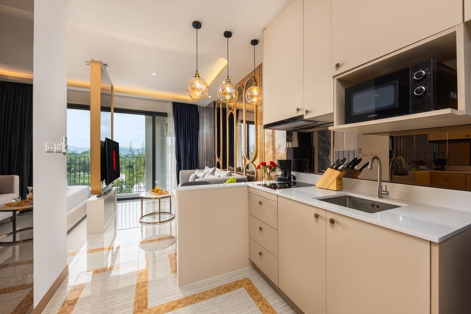 Design Apartment, Balcony, Lagoon View | Private kitchen | Coffee/tea maker, electric kettle, toaster, dining tables