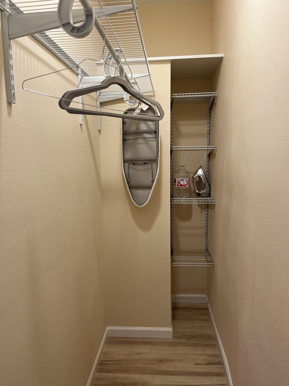 Walk In Closet with Iron and Board