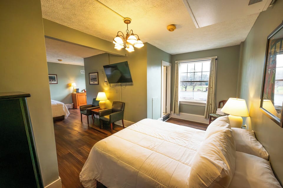 Rest deeply in a cozy suite with warm, inviting glow.