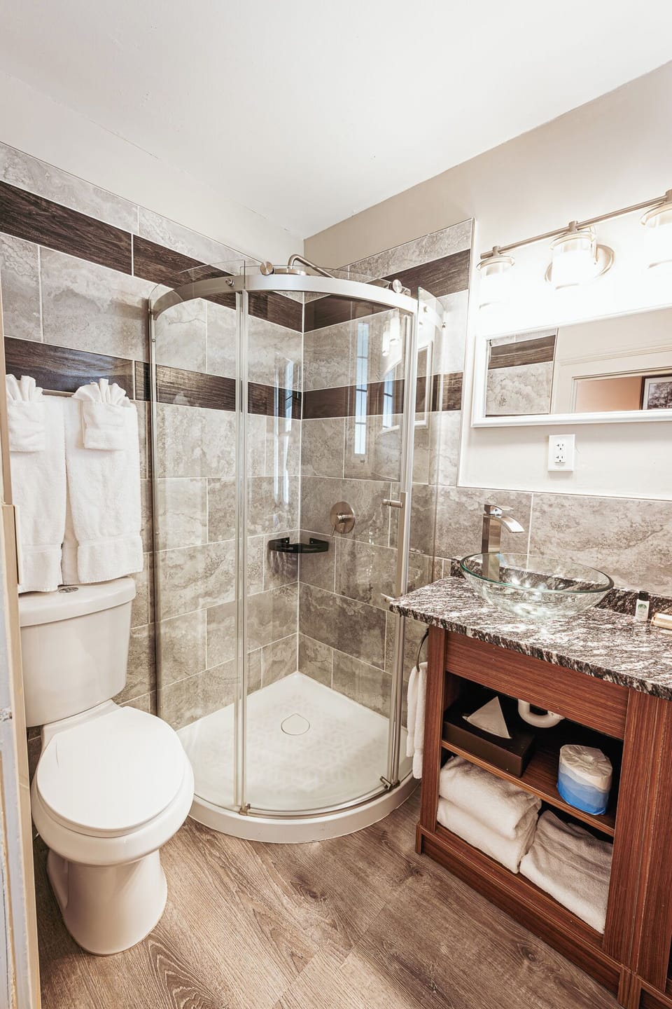 Refresh in a modern bath with glass shower and vanity.
