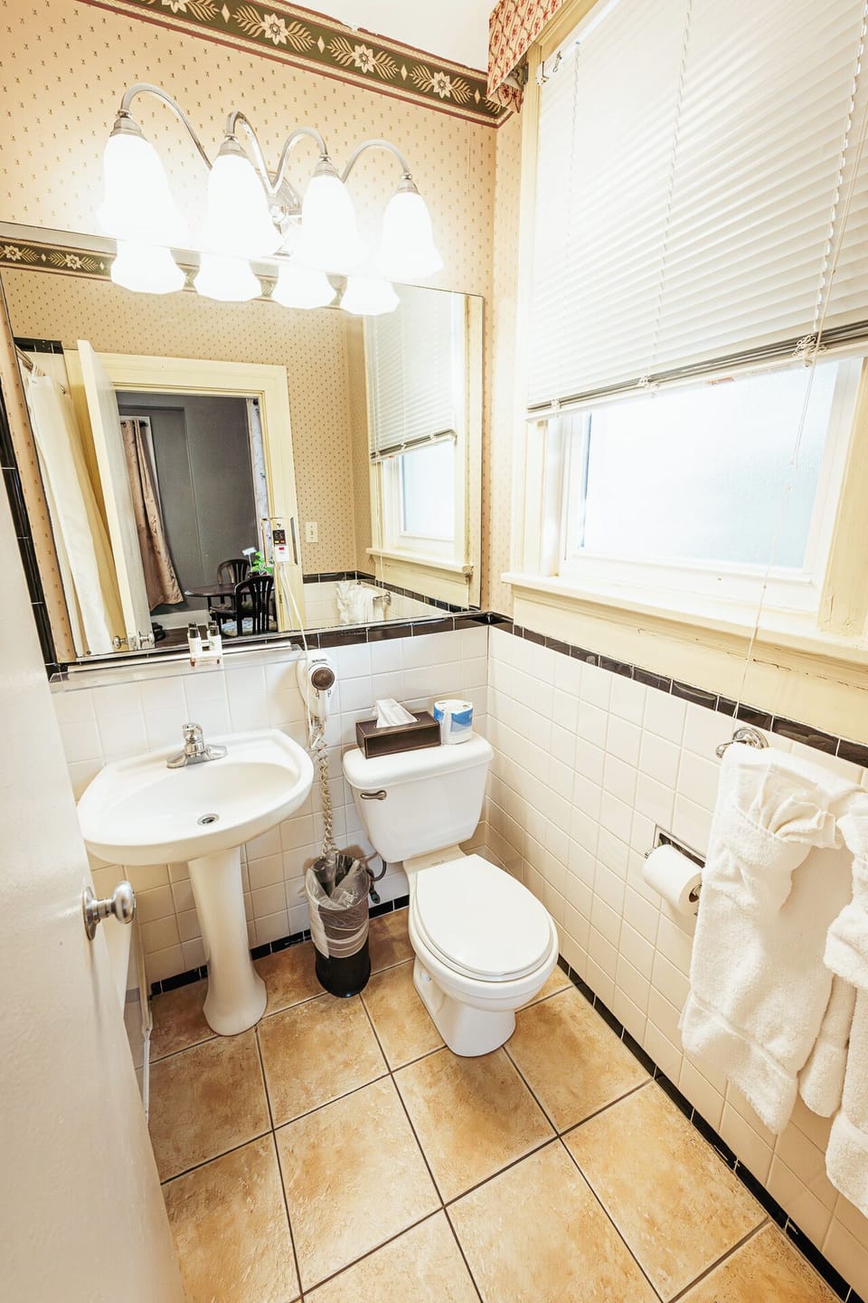 Refresh easily with bright vanity space and fluffy towels.