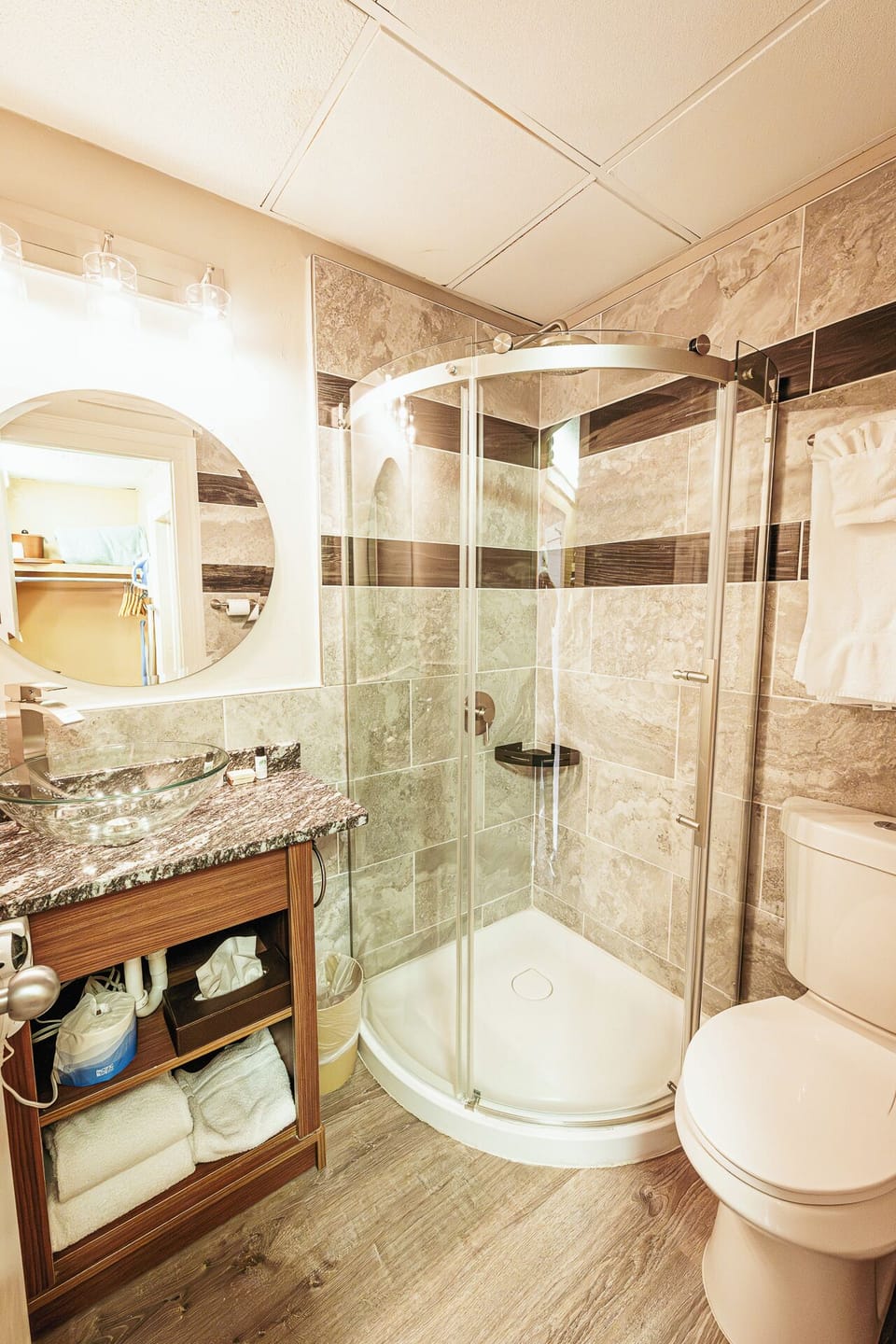Indulge in a sleek glass shower and spa-like finishes.