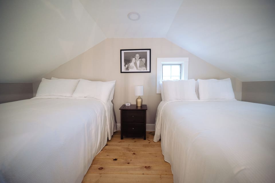 Settle in comfortably with two beds and cozy upstairs charm.