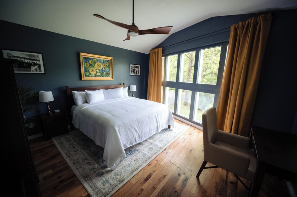 Wake up refreshed in a sunlit king bed sanctuary.