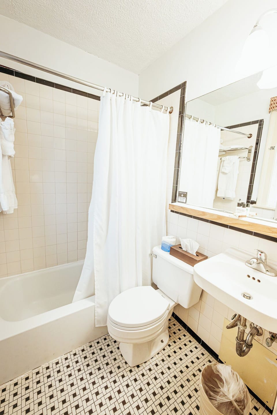 Rinse off in a clean, classic tub-and-shower combination