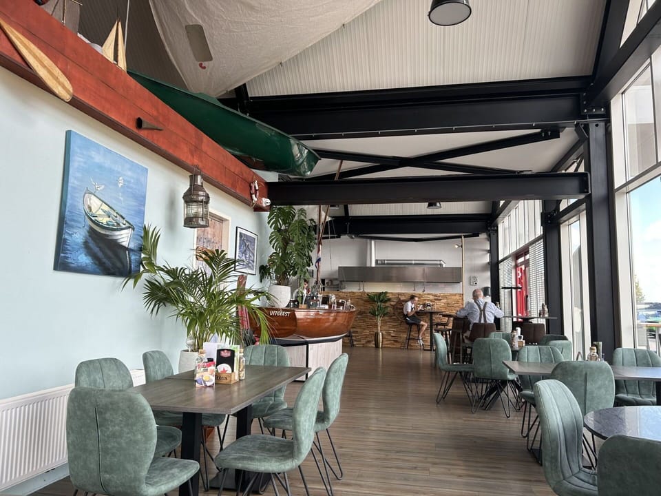 Furniture, Table, Restaurant, Chair, Kitchen & Dining Room Table, Houseplant, Cafeteria, Coffee Table, Design, Outdoor Table