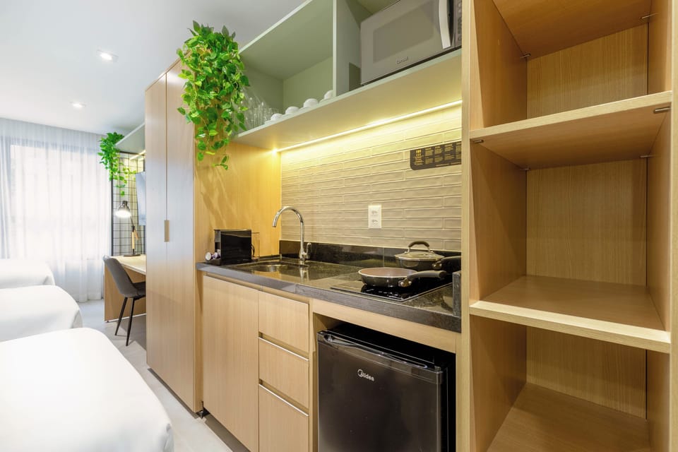 Family Room, Kitchenette | Private kitchenette | Microwave, stovetop, espresso maker, coffee/tea maker