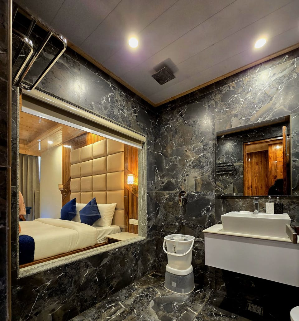 Shower, free toiletries, slippers, towels