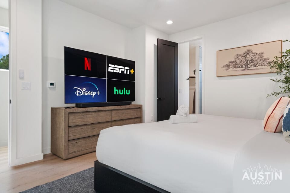 A king-sized bed and a screen full of options. Vacation mode: activated.
