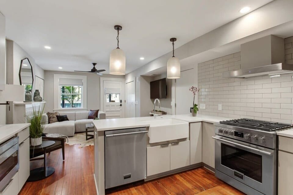 Kitchen | Open Concept Kitchen with Stainless Steel Appliances | First Floor of Building — Unit on One Level