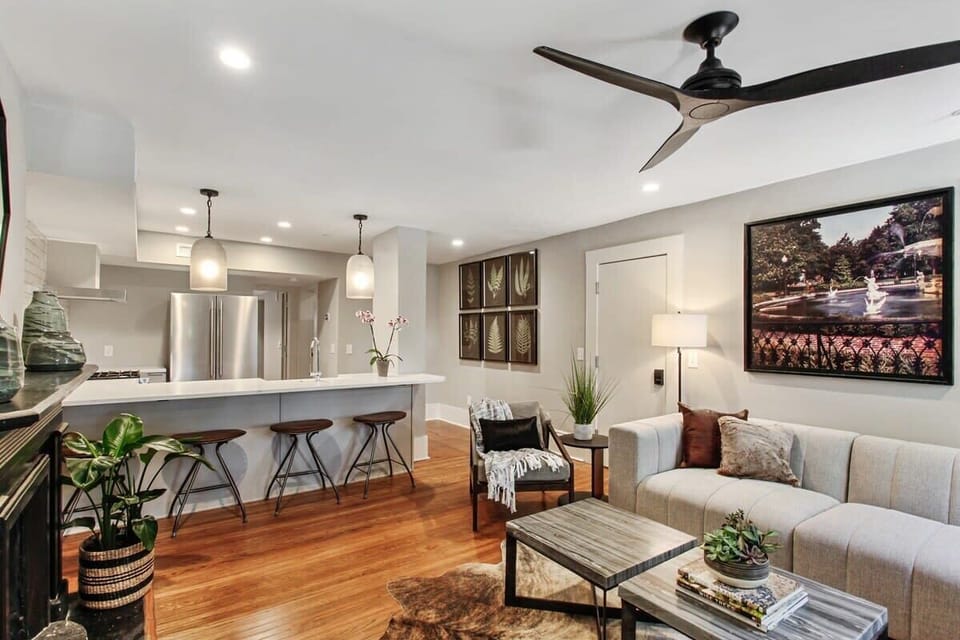  Kitchen | Open Concept Kitchen with Island and Bar Seating | First Floor of Building — Unit on One Level
