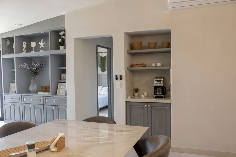 Unique built-in shelving adds character to this bright interior.