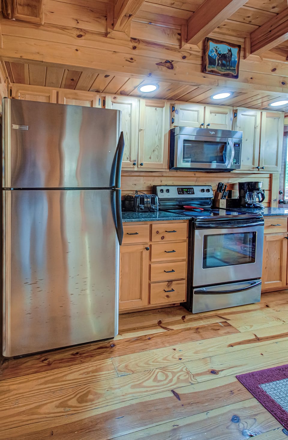 Kitchen with stainless steel appliances and granite counter tops