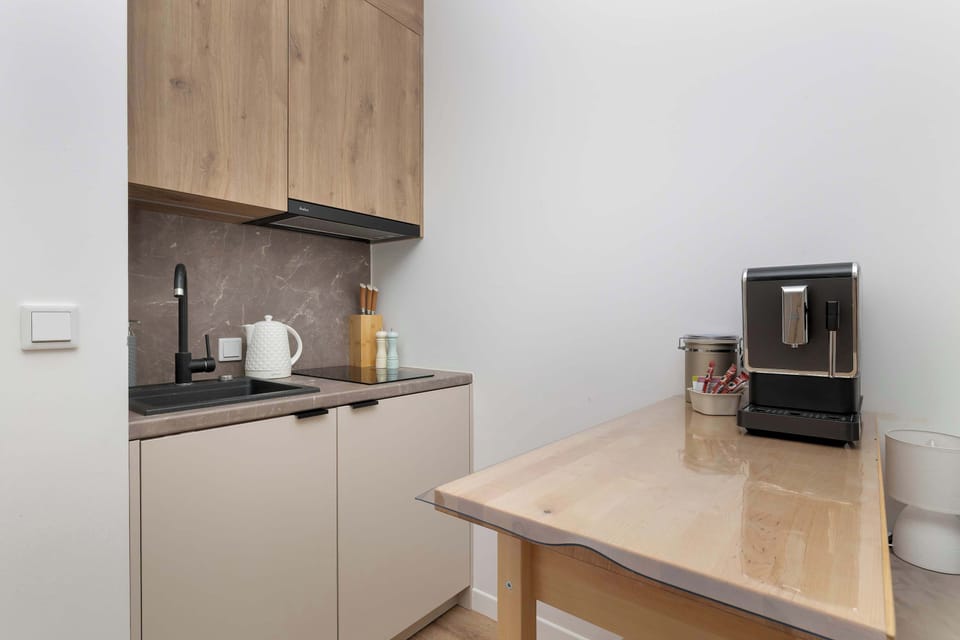 The fully equipped kitchenette includes everything you need for a home-cooked meal.