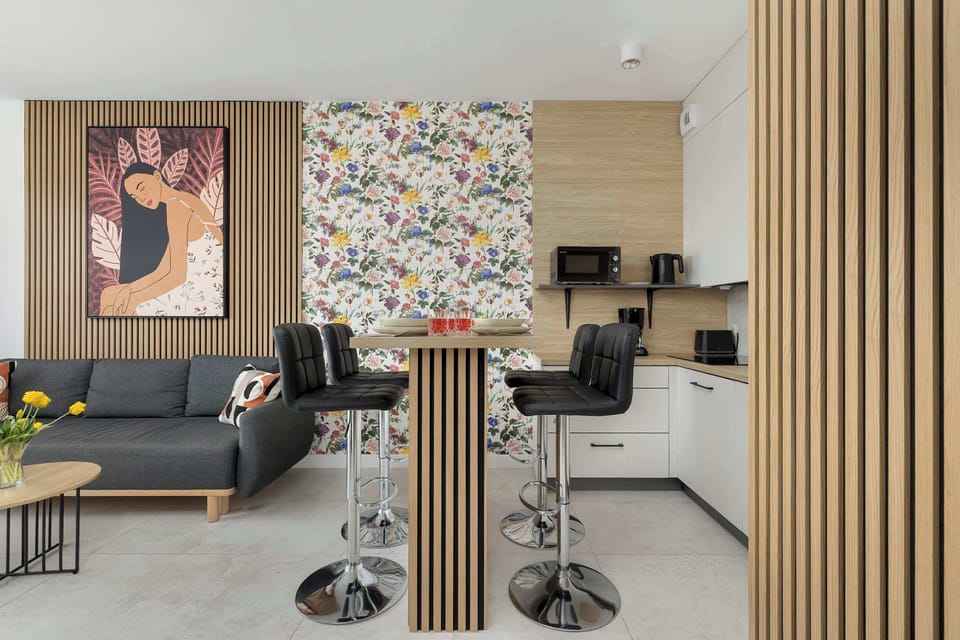 Dining area with table and high chairs.