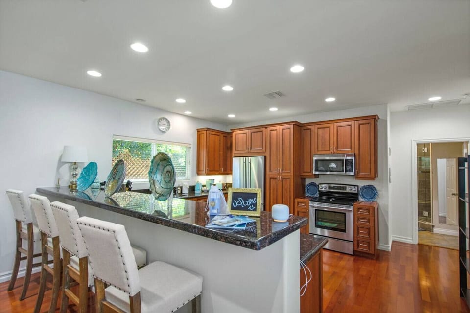 Bright and spacious kitchen with modern amenities, perfect for whipping up delicious meals during your stay!