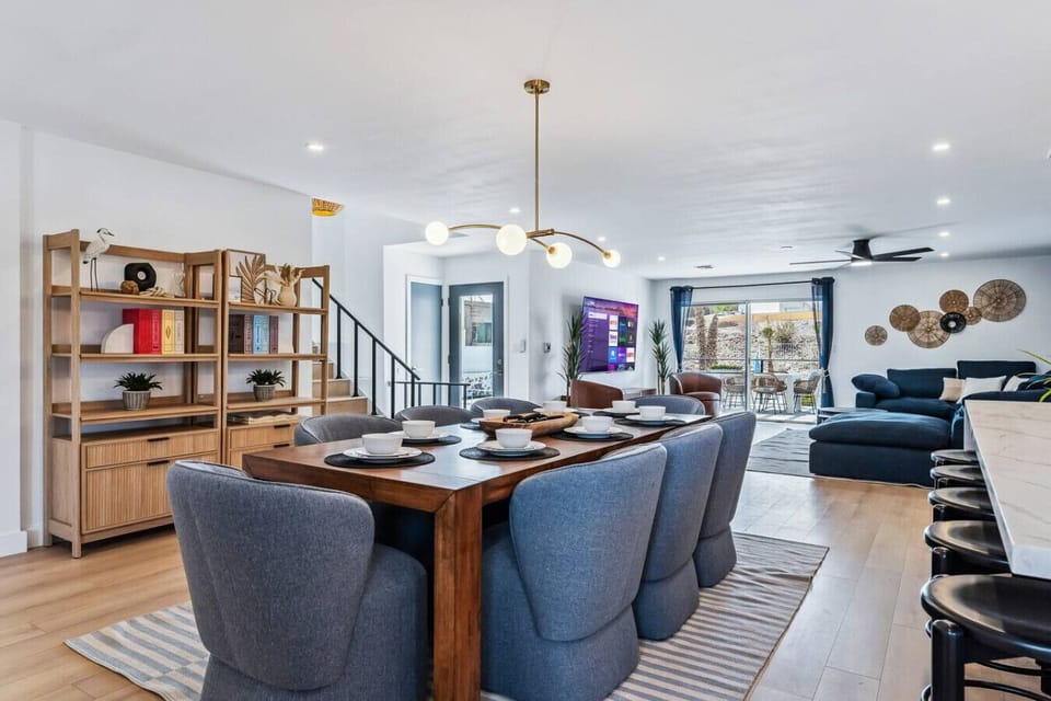 Enjoy meals at the stylish dining table or unwind in the comfortable living space.