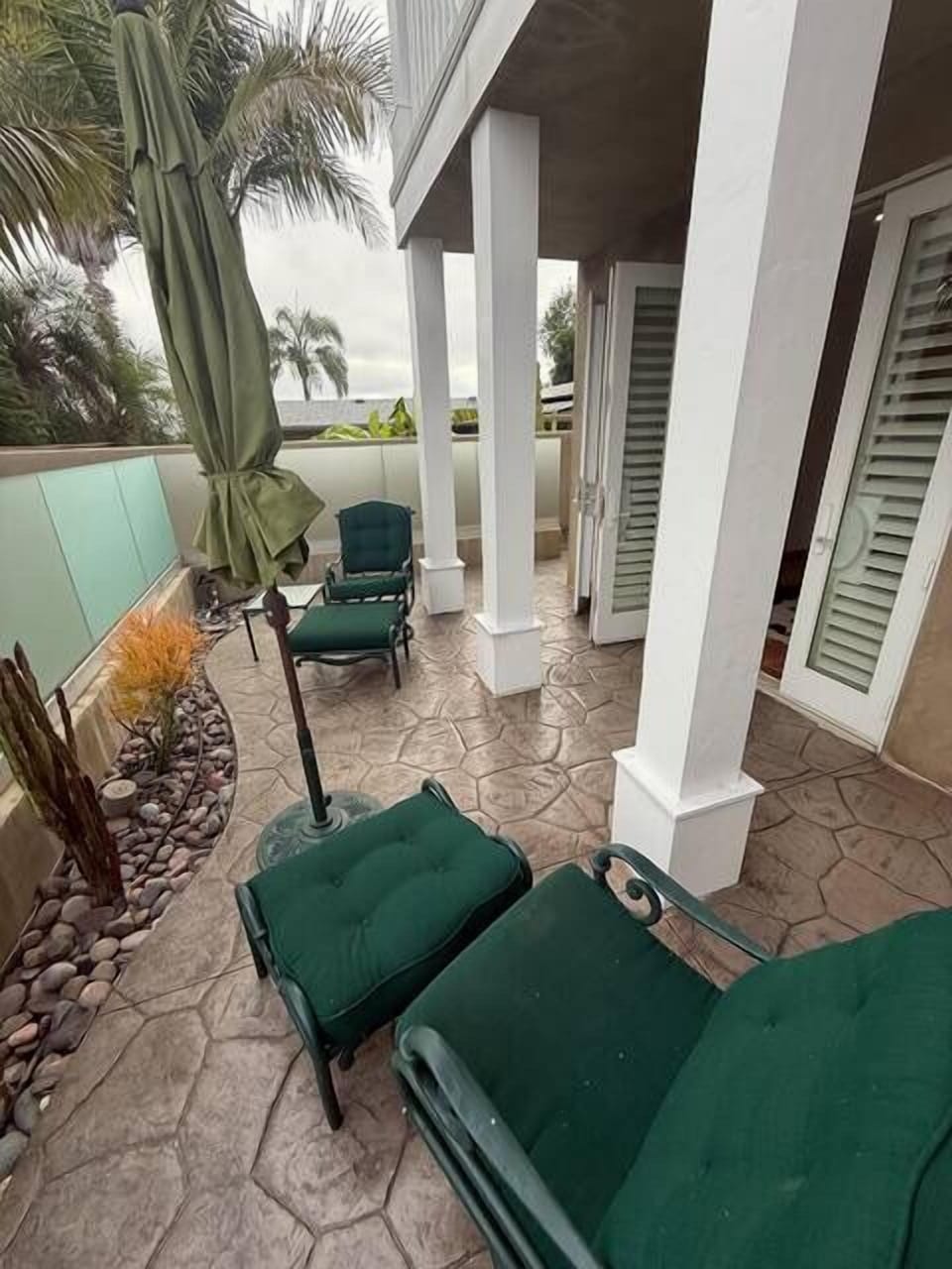 Cozy, shaded patio area perfect for morning coffee or evening wine