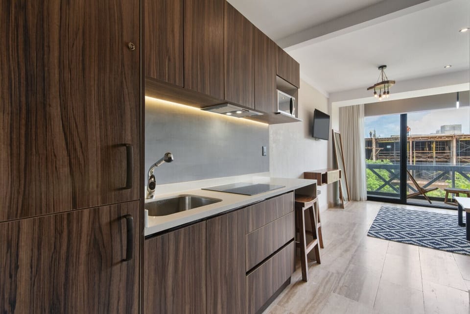 Fully equipped kitchen with modern style—ideal for cozy meals at home.