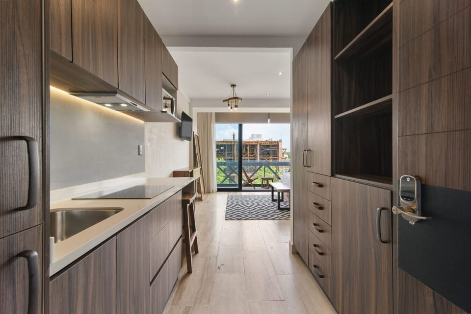 Stylish kitchen with natural light and top appliances.