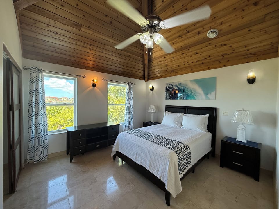 View of Queen bed from door