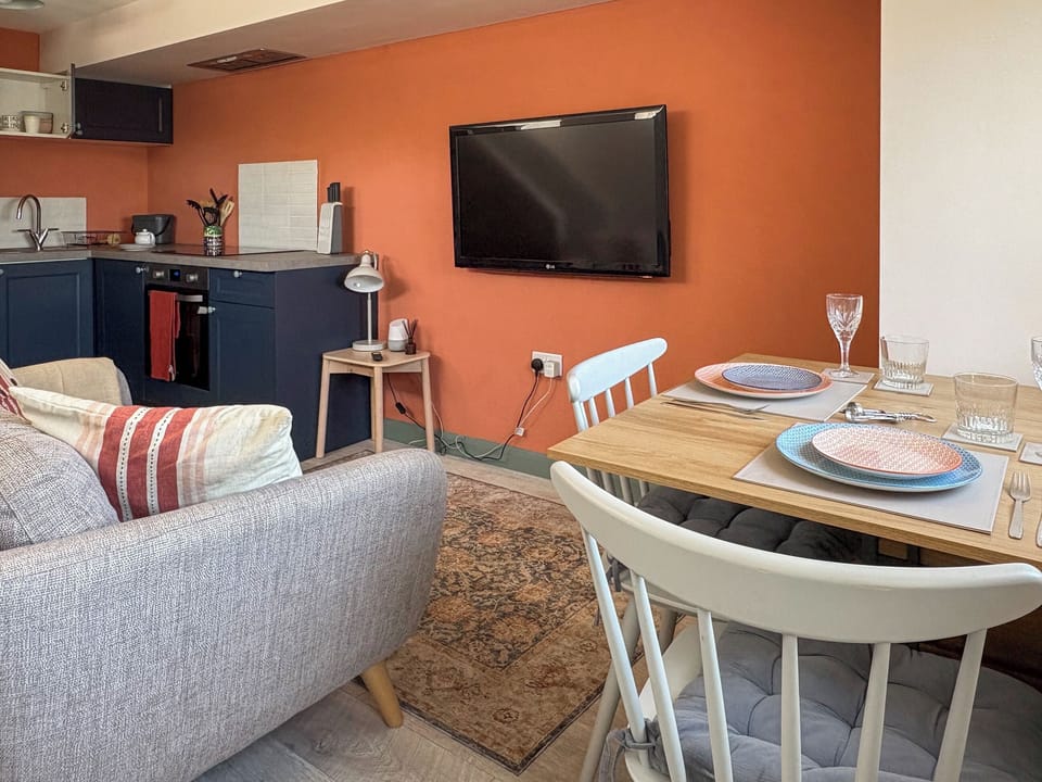 Cosy dinner and comfy seat in front of tele, after a busy days in the countryside and coastal spots! | Bay Tree, Sturminster Newton