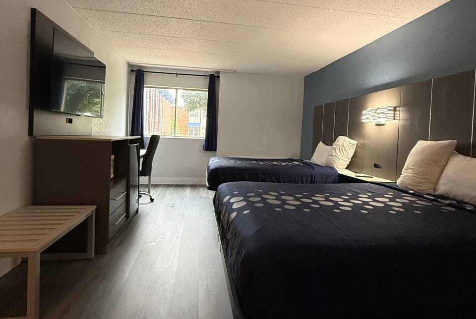 Standard Room, 2 Queen Beds, Non Smoking | Desk, laptop workspace, WiFi (free), bed sheets