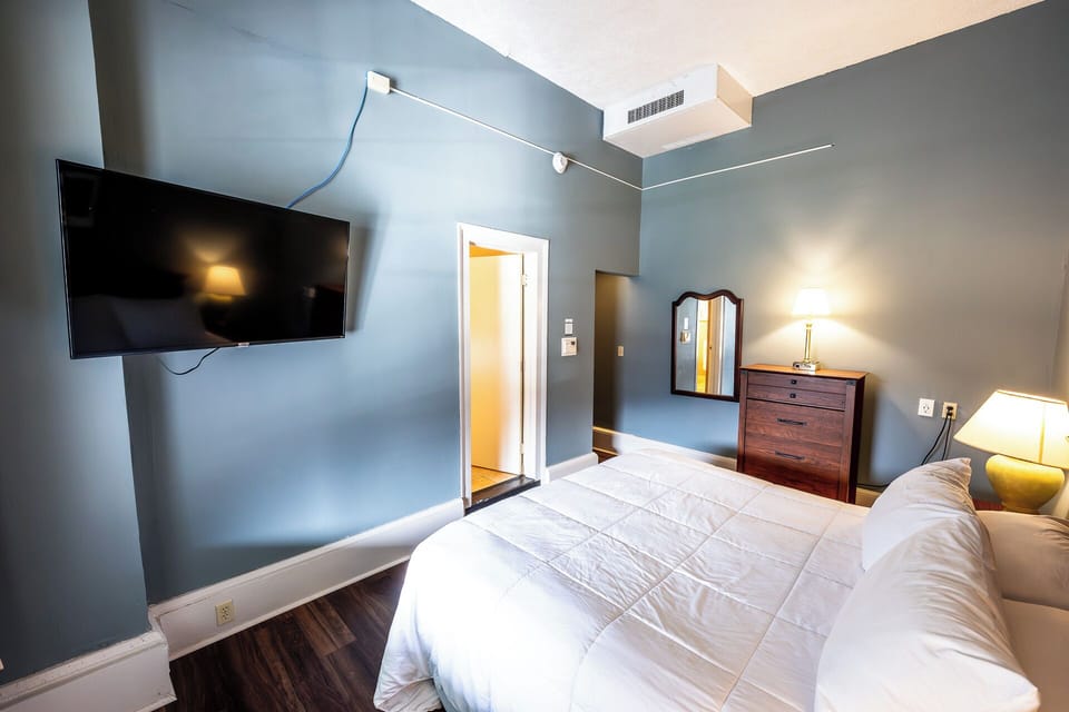 Stretch out comfortably with a large TV and restful ambiance.
