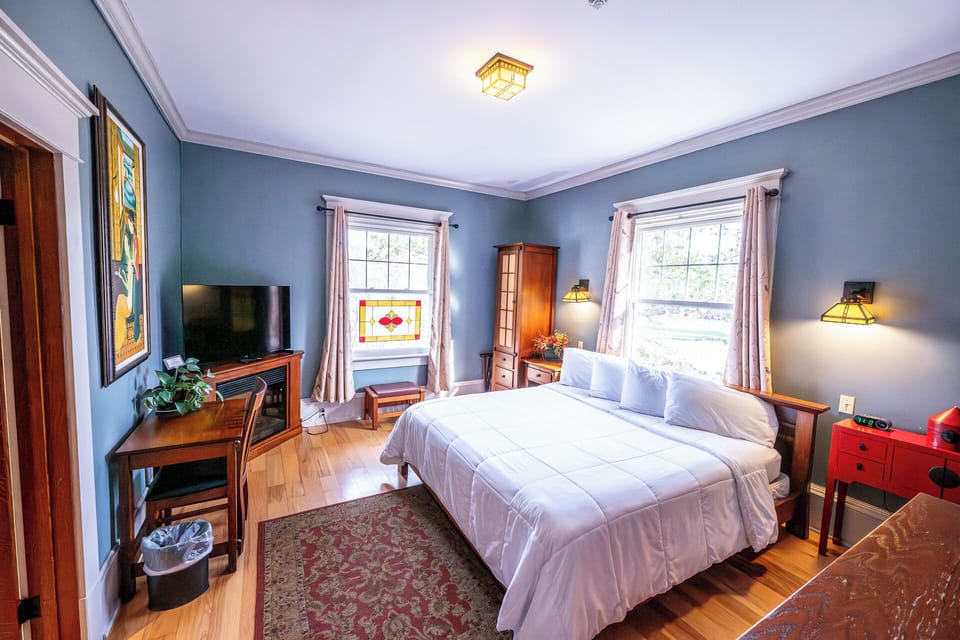 Unwind in a bright, airy bedroom with crisp linens.