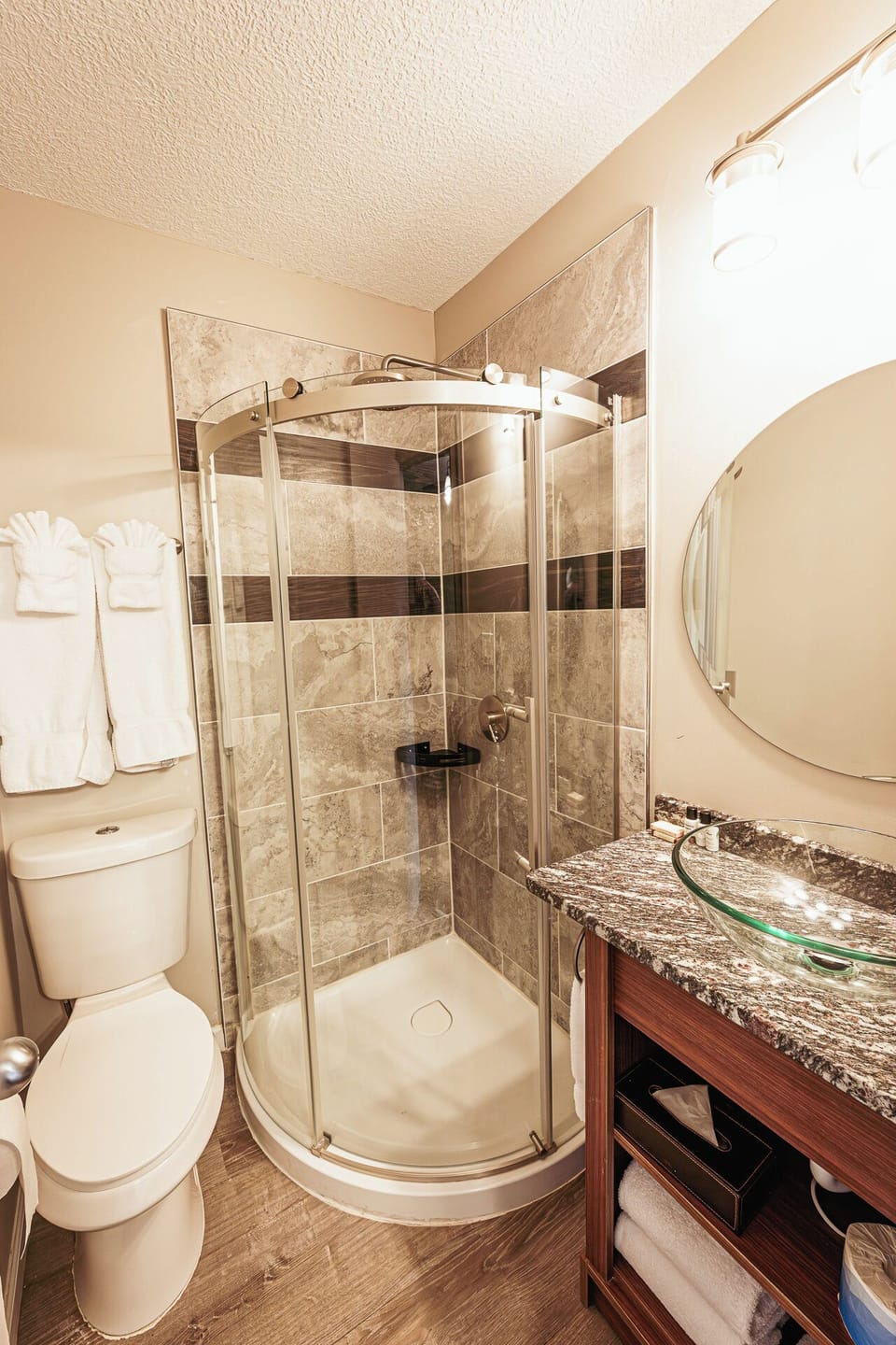 Refresh in a sleek glass shower with bright, modern finishes