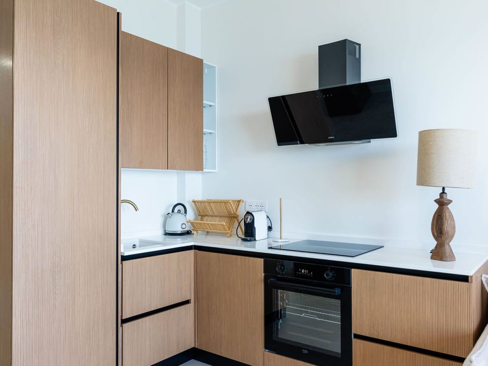 Kitchen, Wood, Countertop, Cabinetry, Furniture, Interior Design, Kitchen Appliance, Major Appliance, Flooring, Room