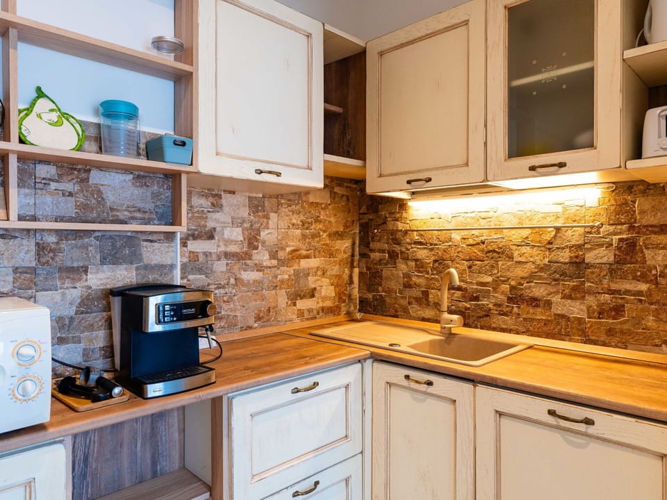 Countertop, Kitchen, Kitchen Appliance, Cabinetry, Major Appliance, Interior Design, Home Appliance, Flooring, Cupboard, Sink