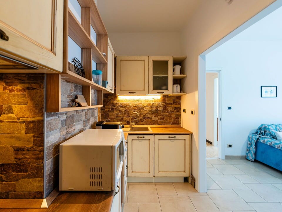 Interior Design, Kitchen, Flooring, Wood, Furniture, Countertop, Ceiling, Floor, Room, Cabinetry