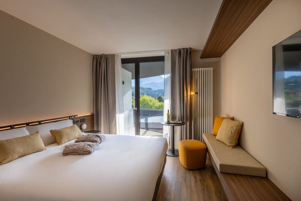 Comfort Double or Twin Room | Minibar, in-room safe, desk, laptop workspace