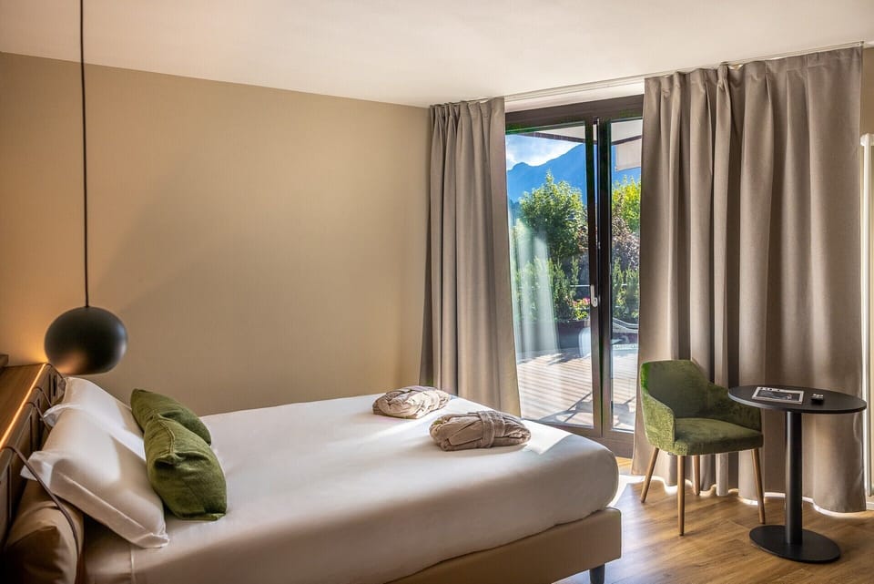 Junior Double Room, Balcony, Mountain View | Minibar, in-room safe, desk, laptop workspace