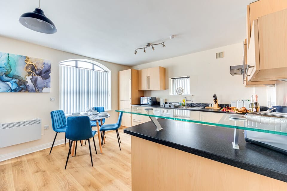 Dining area with seating for up to 4 guests.