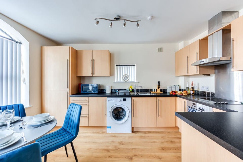 A fully equipped kitchen with all the essentials to prepare and enjoy home-cooked meals.