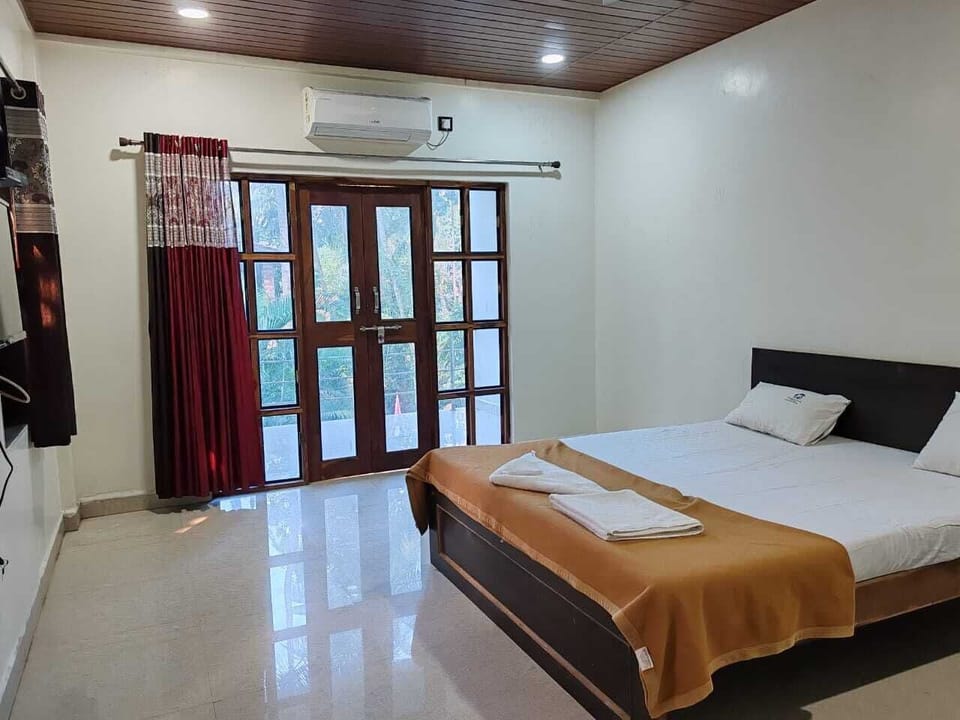 Deluxe Double or Twin Room, Garden View | Desk, free WiFi