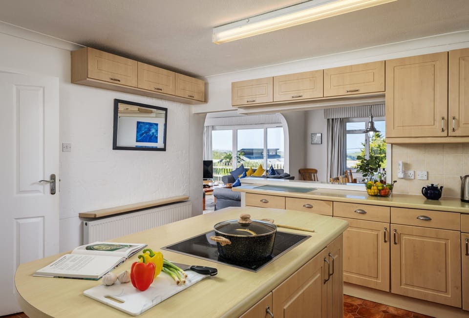 Boskenna, Tintagel: Kitchen with electric oven and induction hob, dishwasher, washing machine, tumble dryer, microwave and fridge/freezer.