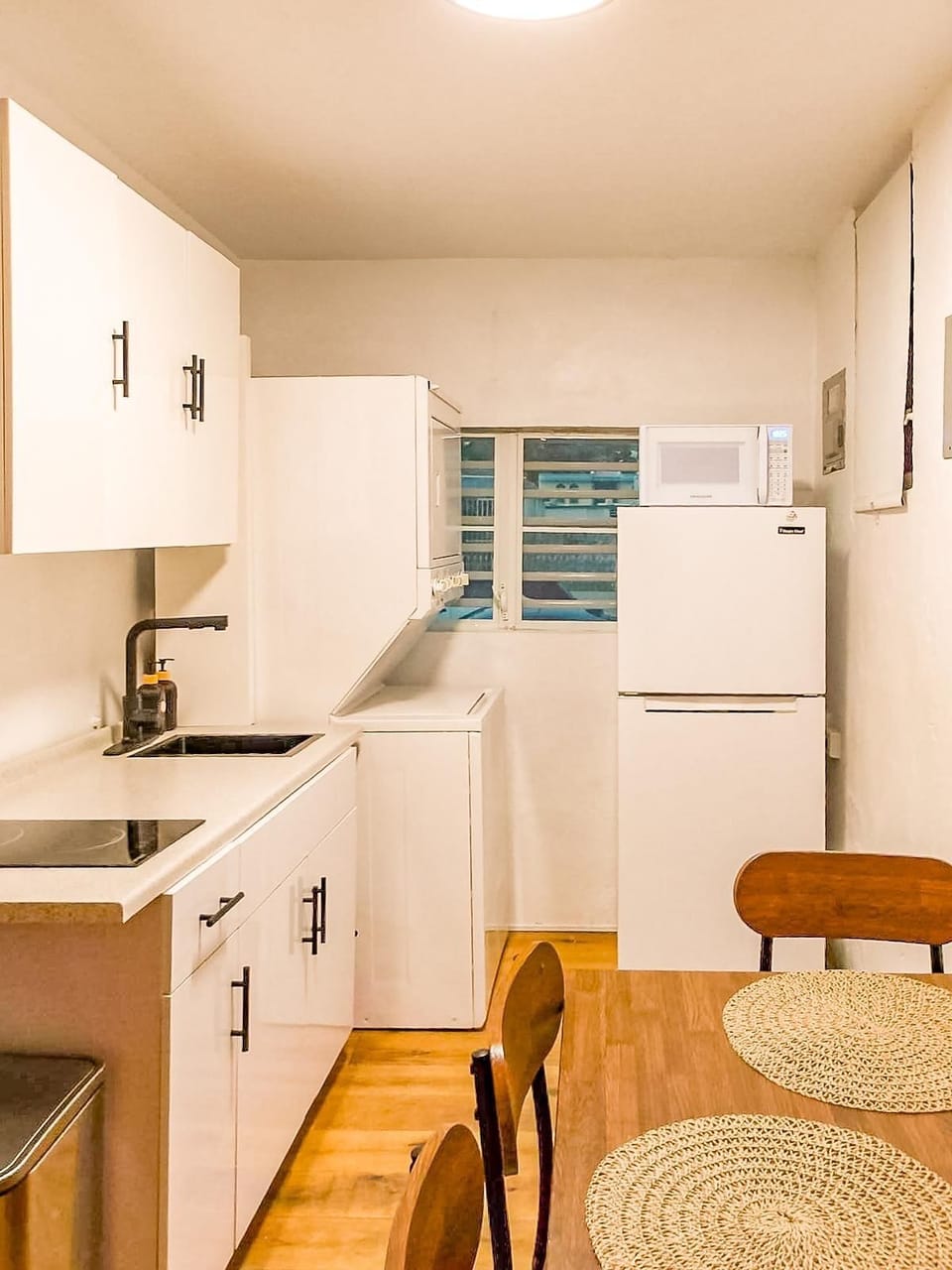 Everything you need a kitchen with laundry included.