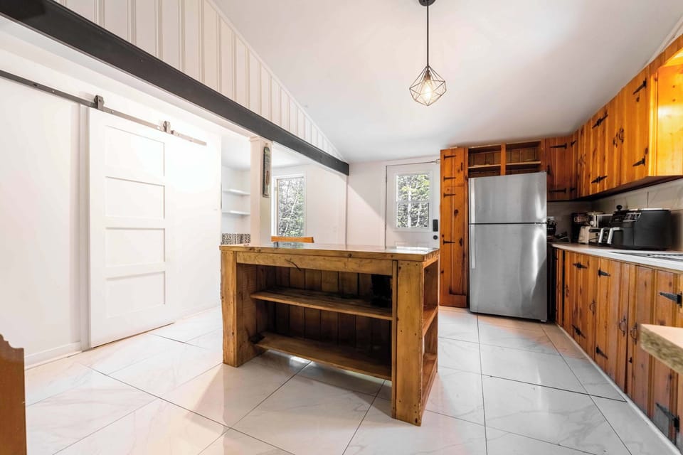     Fully equipped kitchen designed for family cooking and gatherings.