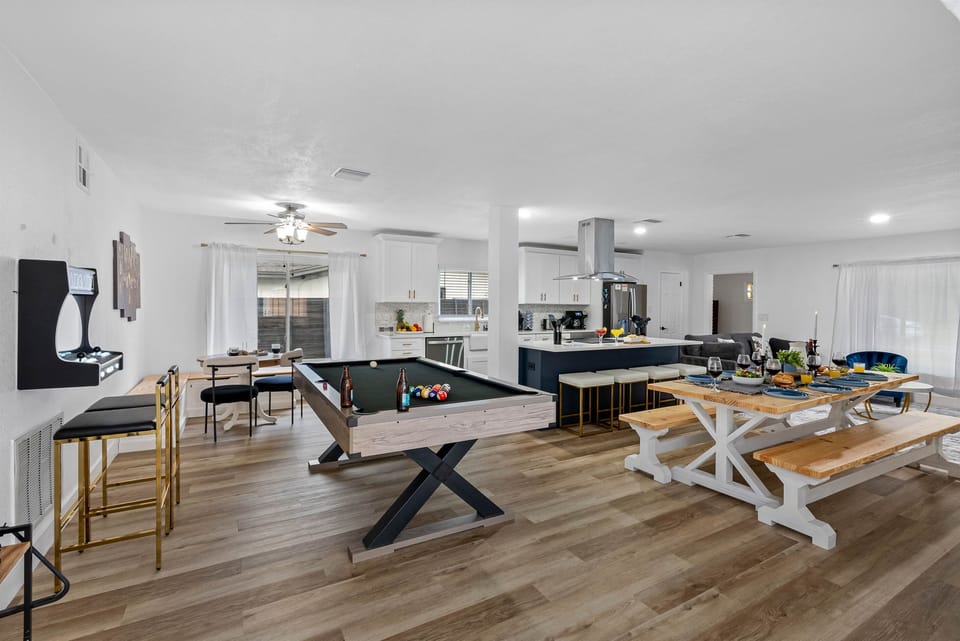 Welcome to your private game zone—complete with a full-size pool table, classic arcade machine, and foosball for hours of family fun!