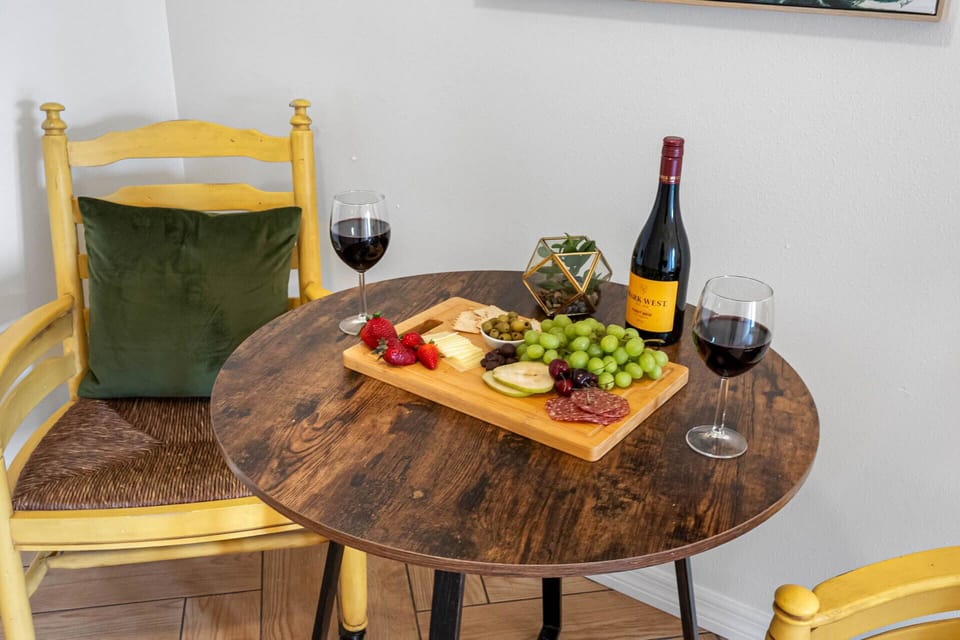 This quaint corner, nestled near the kitchen, is ideal for enjoying a moment of calm with a cup of tea or glass of wine.