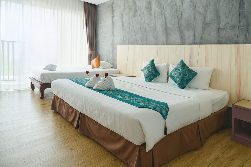 Triple Room, Balcony, City View | In-room safe, desk, laptop workspace, iron/ironing board